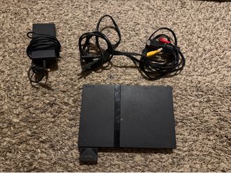 PlayStation 2 Slim + Guitar Hero lll Bundle