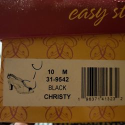 Easy Street Christy peep-toe sandal in black fabric. 