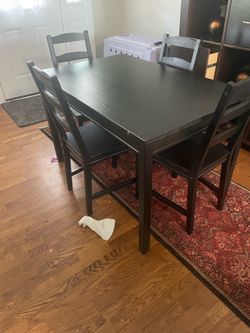 Nice IKEA dining table with 4 chairs