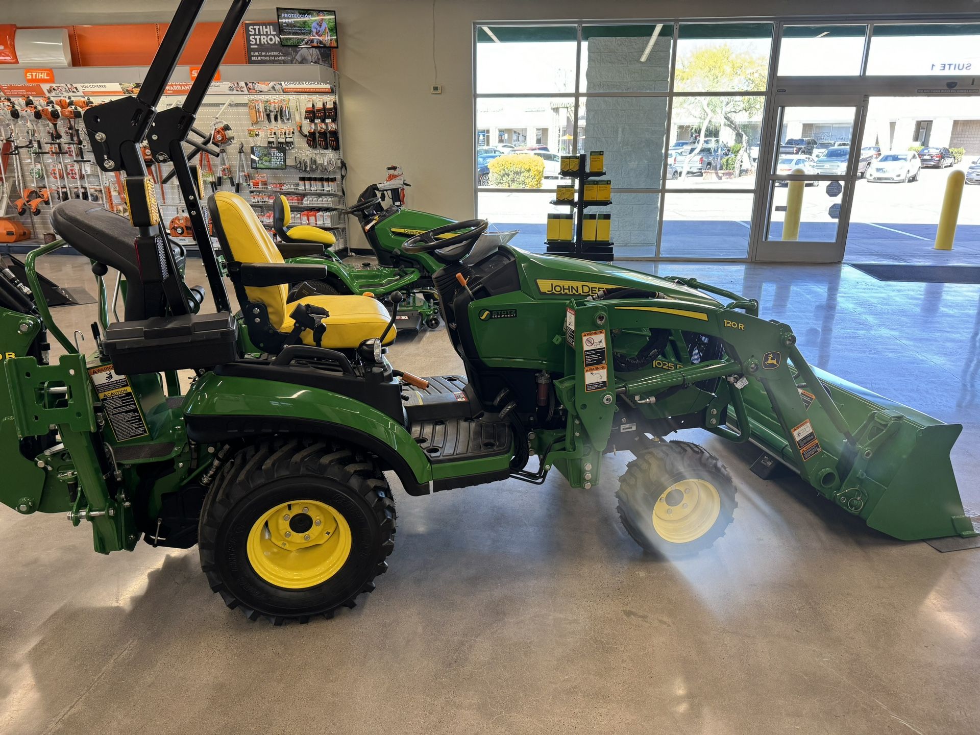 New John Deere 1025r backhoe and Gannon