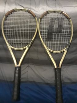 Two Prince Triple Threat rip tennis racket