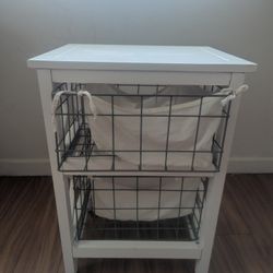 
2 Drawer Organizer, White , solid wood frame with matel baskets, very good condition and quality . 
16.75" W, 13.5" D, 23.5" H
