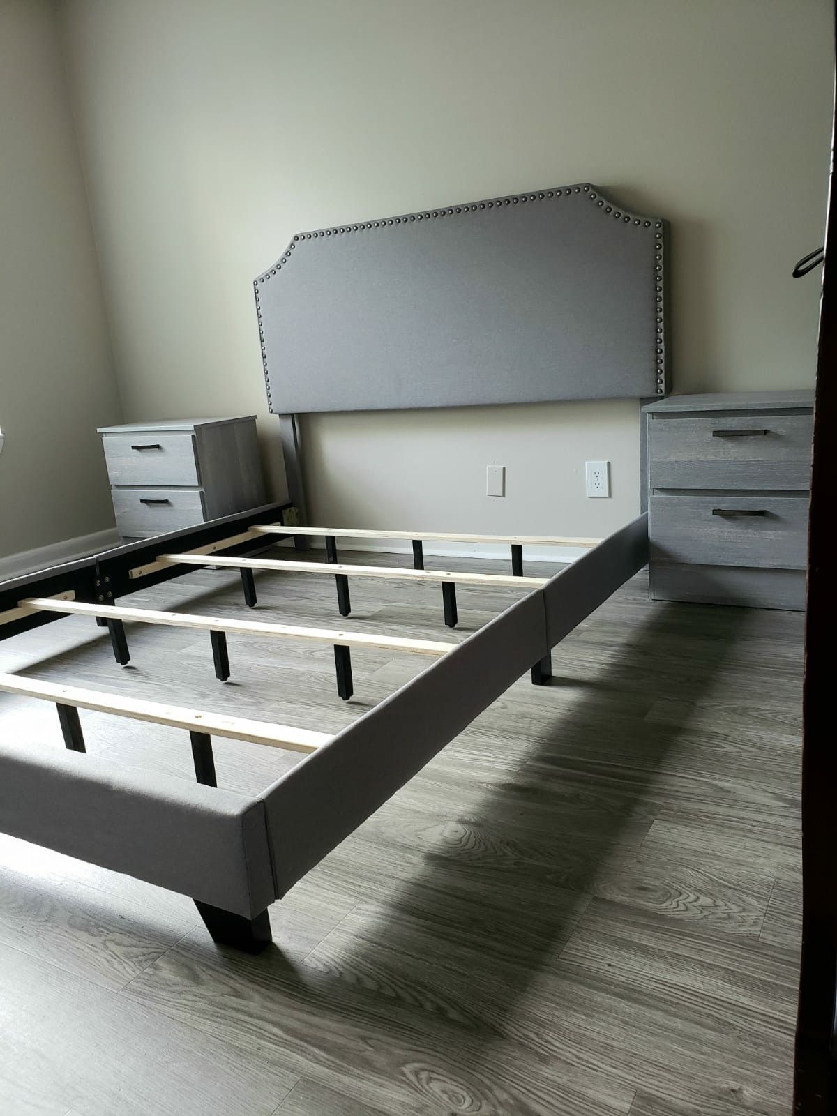 NEW IN BOX QUEEN UPHOLSTERED BED FRAME AND TWO NIGHT STANDS MATTRESS