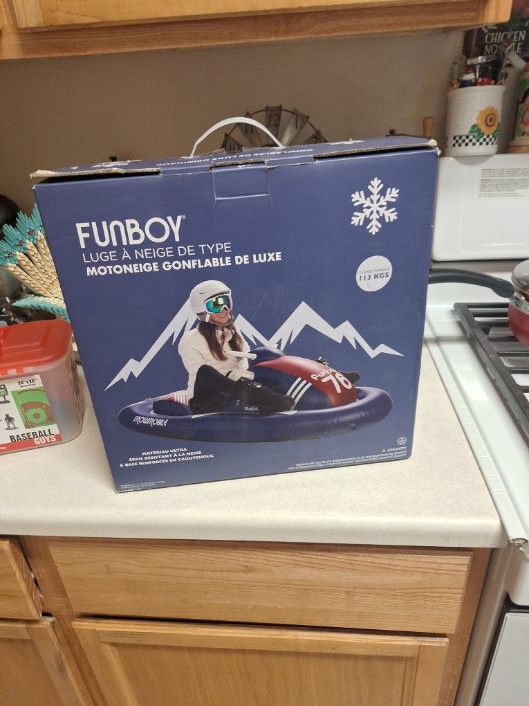 NEW FUNBOY SNOWMOBILE SNOW SLED LUXURY INFATABLE. $75 FIRM PRICE