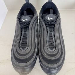 A pair of Nike Air Max 97 sneakers in an all-black colorway. 