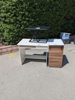 Office Desk +  separate stand up desk & filing cabinet. July 4th moving sale. Everything must go.