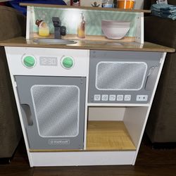 Kids kitchen with toy food