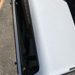 ARE truck bed topper side window broken 