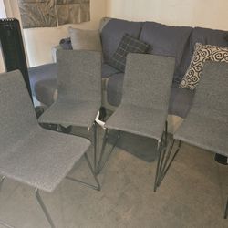 Four Grey Chairs