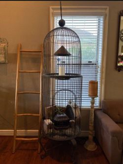 Beautiful oversized decorative bird cage measuring 9 feet tall.