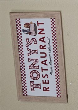 Disney Lady and the Tramp Tony's Restaurant Wood Framed Wall Art featuring a classic red-and-white checkered border and a silhouette of Lady and the T
