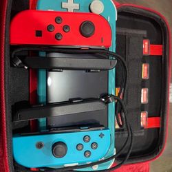 Nintendo Switch Lite +games + Chargers Cases