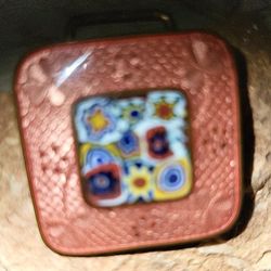 MOSAIC, Lucky belt buckle.