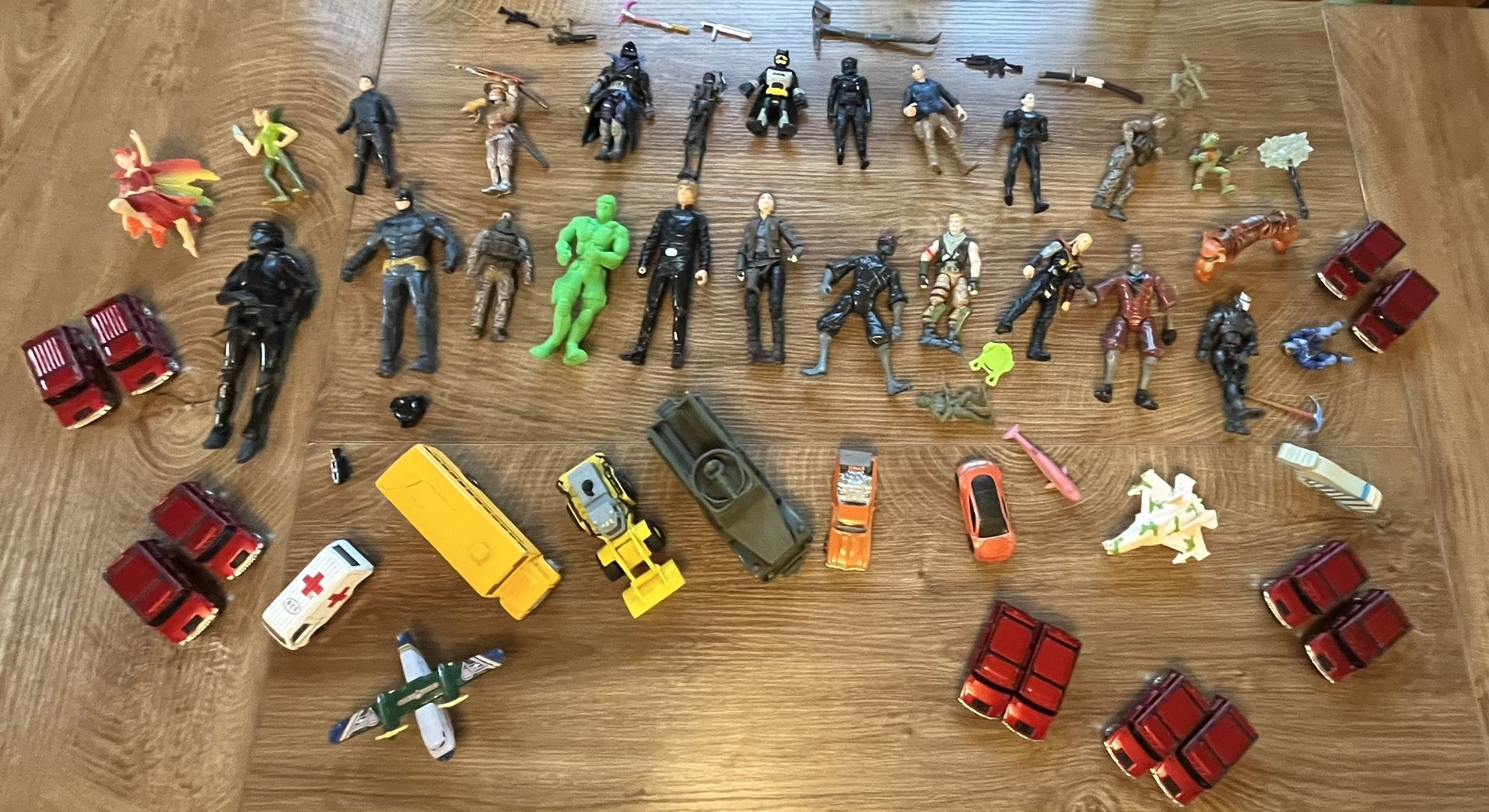 Large Assortment of Action Figures and Toy Vehicles