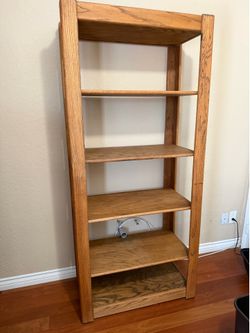 Oak bookshelf. Adjustable shelves. 75” tall , 33.5” wide, 17.5” deep.