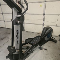 NordicTrack Commercial 1300 Elliptical W/Power Incline Ramp. Open to reasonable offer.