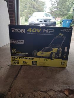Ryobi 40 volt self-propelled electric lawn mower brand new in the box 20-in cut never used not even put together