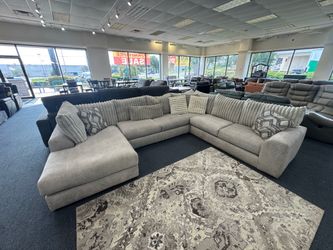 White fabric sectional with chase