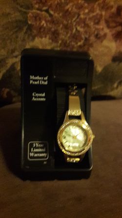 New gold rinestone watch.