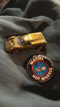 Hotwheel vintage red line Ford J car Back opens up to show motor Hotwheel vintage red line Ford J car