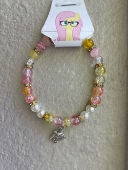 Handmade Fluttershy glass beaded bracelet