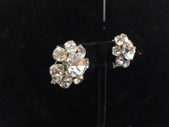 Vintage silver toned flower clip on earrings with Austrian crystal rhinestone signed AUSTRIA