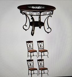 A dining table with 4 chairs