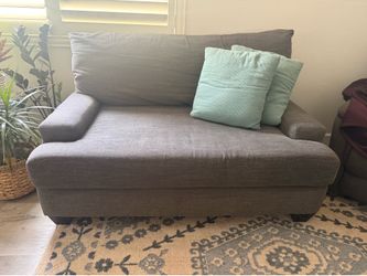 Grey couch from living spaces
