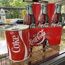 8 oz Coca Cola soda can, bottom opened