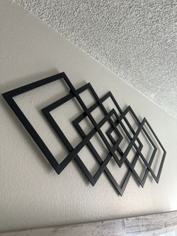 Modern black metal geometric wall art