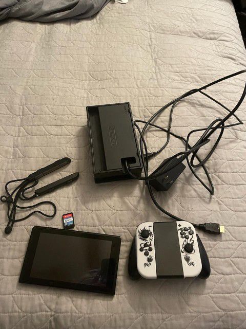 Nintendo Switch Like New!! W / Controllers ,Sim Card, & More