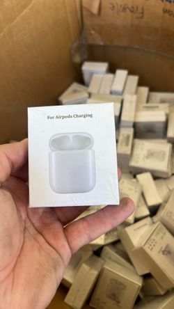 Box full of brand new air pod chargers