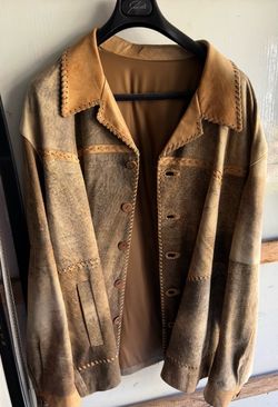 vintage genuine suede/leather jacket with extensive hand-laced detailing