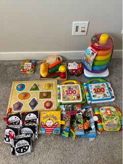 Lots of baby toys/ vtech/ leapfrog/ Melissa & Doug/ fisherprice/ cloth books