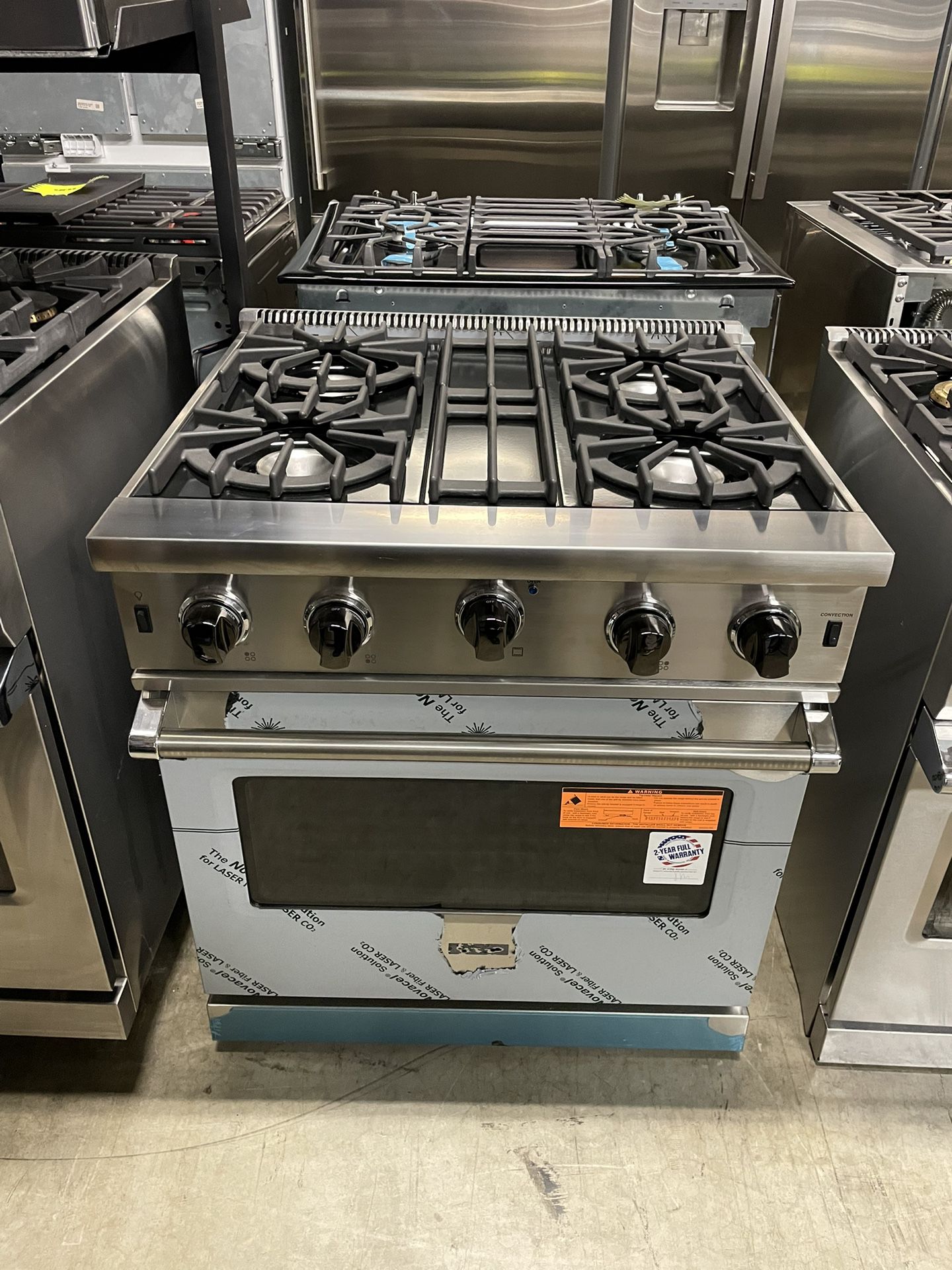 30 Inch Freestanding Professional Gas Range with 4 Open Burners, 4 Cu. Ft. Oven Capacity, Continuous Grates, Manual Clean, SureSpark™ Ignition System,