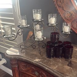 Candle holder with exchangeable cups