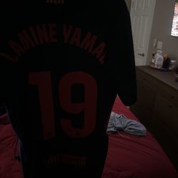 Lamine yamal Barca black and red jersey