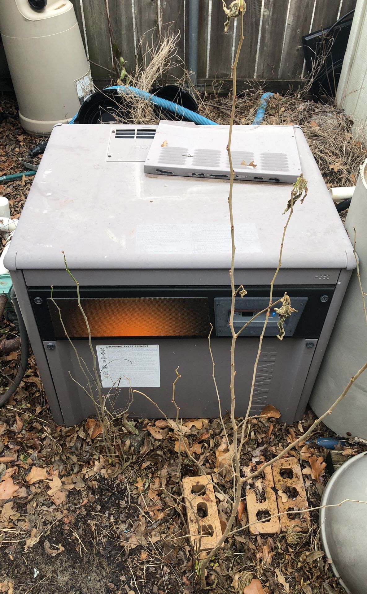 H350 HAYWARD POOL HEATER with filter and 120 gallon propane tank for