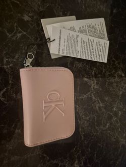 Calvin Klein pink faux leather zip-around wallet