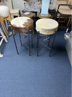 Brand new cowhide barstool set