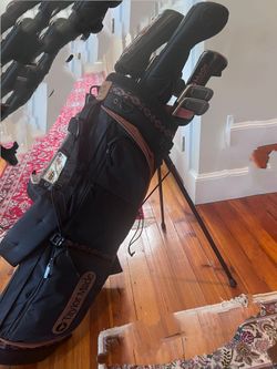 Full set of Taylor made clubs, along with Titlest Bag/Balls/Tees