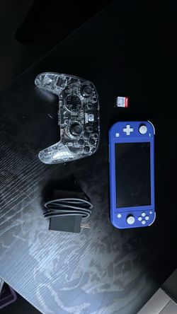 Nintendo switch lite with game and controller  ( barely used )