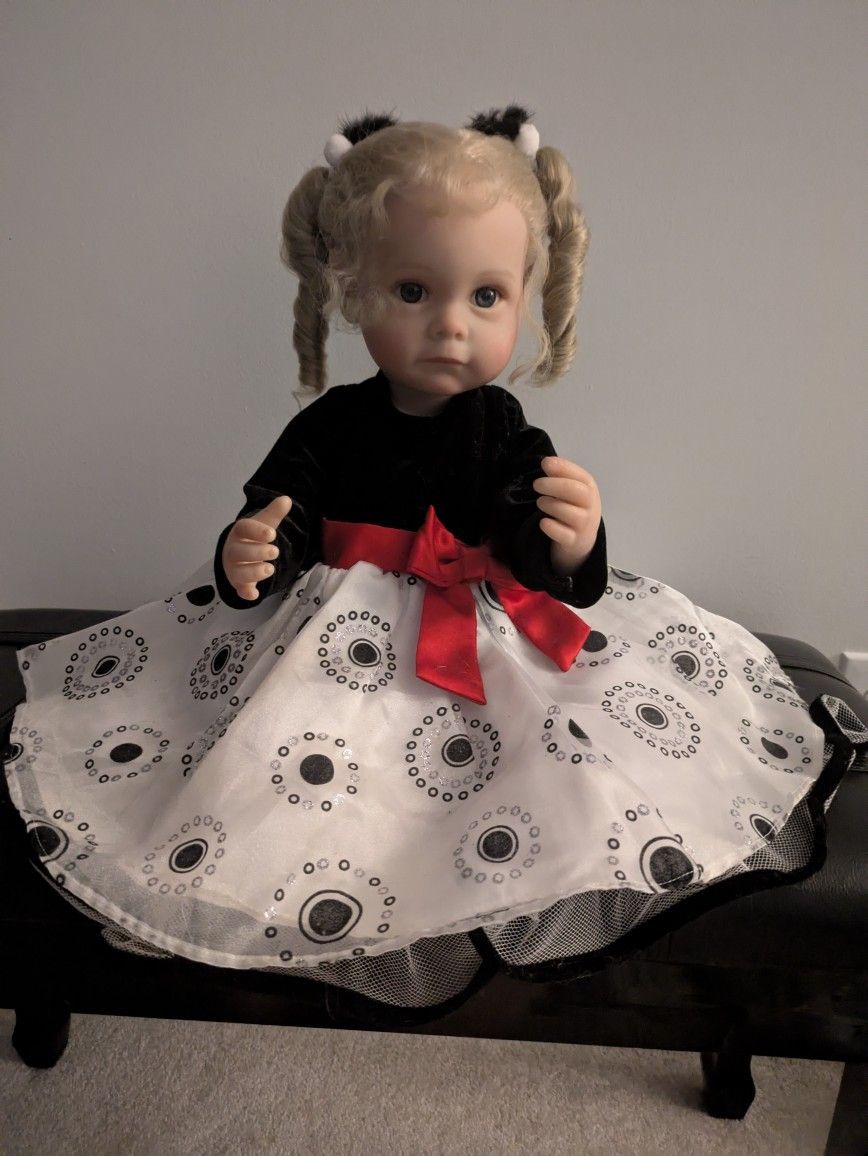 Beautiful Doll. She Is Wearing Pig Tails
