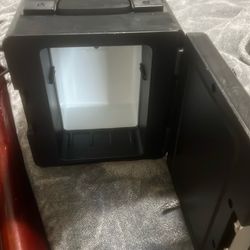 Mini refrigerator with built in radio