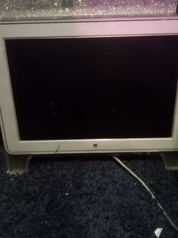Apple Display And A Couple Imac Computers