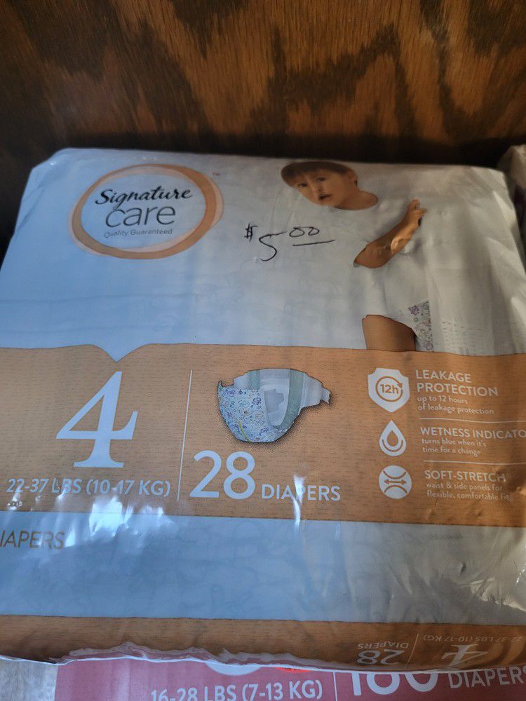 NEW SEALED SIZE 4 28 CT DIAPERS