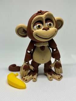 3D Printed Articulated Monkey Figure with Banana