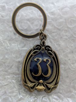Disney club 33 pendant keychain