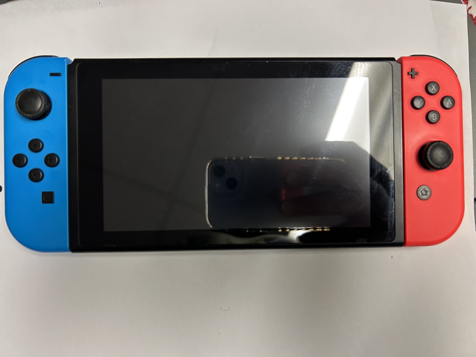 Nintendo Switch 32GB Gray Console with Neon Red and Neon Blue Joy-Con. Great condition. Bestbuy certified; in great condition, comes as shown. Item is