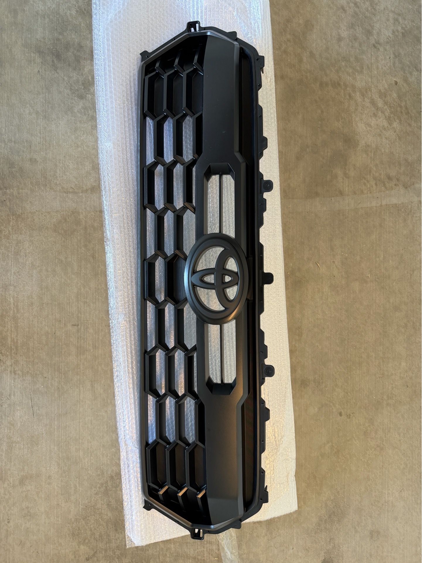 OEM Grille with Blackout Toyota Emblem - 2025 Tacoma